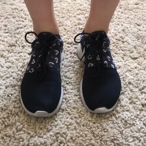 Black cheetah Nike shoes